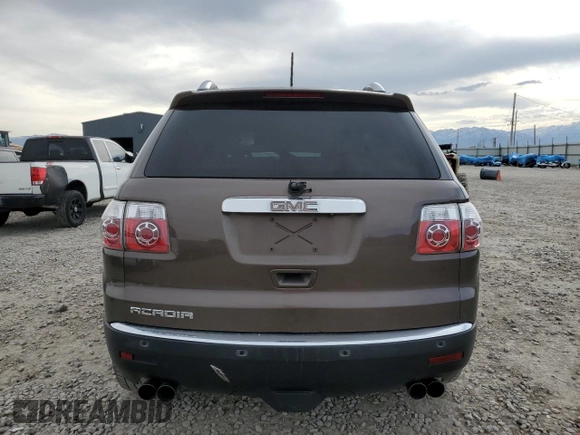 2009 GMC Acadia SLT2 z VIN 1GKER33D69J148077, wystawiony jako Copart lot #54074735 z przebiegiem Nie podano mil oraz Szkoda całkowita • Salvage title. Historia ofert i sprzedaży dostępna na DreamBid. Obrazek 6.