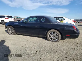 2005 Ford Thunderbird Deluxe with VIN 1FAHP60A35Y105382, listed as a Copart auction lot 88535235 with 104,112 mi miles and Salvage Title. Bid and sale history available at DreamBid. Image 2.