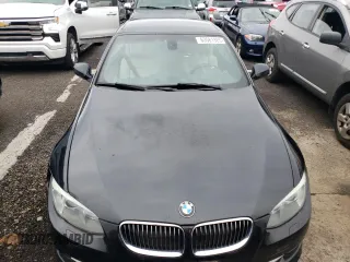 2012 BMW 3 Series 335i with VIN WBADX7C5XCE744190, listed as a Copart auction lot 63581925 with 103,834 mi miles and Clean title. Bid and sale history available at DreamBid. Image 5.