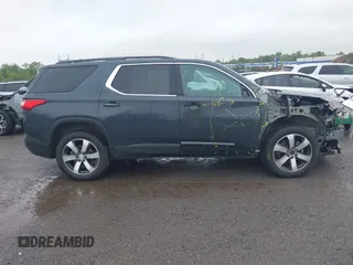 2021 Chevrolet Traverse LT z VIN 1GNEVHKW2MJ195002, wystawiony jako IAAI lot #42314214 z przebiegiem 50 877 mil mil oraz . Historia ofert i sprzedaży dostępna na DreamBid. Obrazek 13.