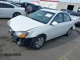 2009 Kia Spectra EX z VIN KNAFE221195608345, wystawiony jako IAAI lot #41950015 z przebiegiem 173 645 mil mil oraz . Historia ofert i sprzedaży dostępna na DreamBid. Obrazek 18.