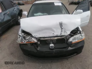 2000 Honda Accord LX z VIN 1HGCG1649YA000482, wystawiony jako IAAI lot #41679083 z przebiegiem 147 209 mil mil oraz . Historia ofert i sprzedaży dostępna na DreamBid. Obrazek 6.