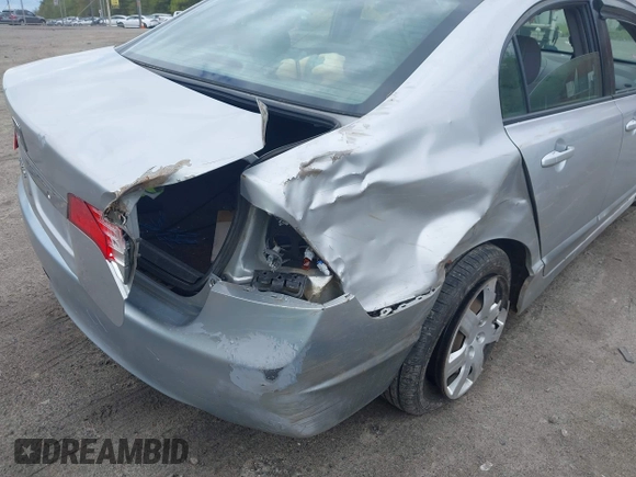 2010 Honda Civic LX with VIN 2HGFA1F59AH323381, listed as a IAAI auction lot 42181040 with 320,419 mi miles and . Bid and sale history available at DreamBid. Image 6.