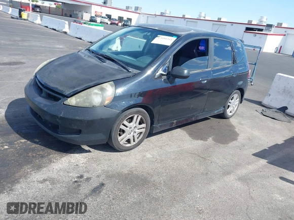 2008 Honda Fit Sport with VIN JHMGD386X8S052358, listed as a IAAI auction lot 42090261 with 291,211 mi miles. Bid and sale history available at carsss.com. Image 2.