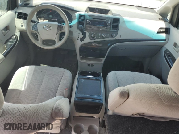 2012 Toyota Sienna LE с VIN 5TDJK3DC2CS044393, выставлен на аукционе Copart как лот 63579595 с пробегом 152 636 миль миль и Списание • Salvage title. История ставок и продаж доступна на DreamBid. Изображение 8.