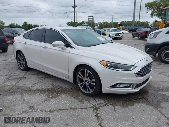 2017 Ford Fusion Titanium with VIN 3FA6P0K99HR272713, listed as a IAAI auction lot 41757334 with 104,733 mi miles. Bid and sale history available at carsss.com. Image 1.