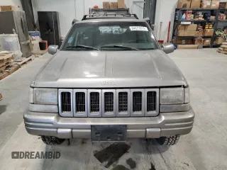 1997 Jeep Grand Cherokee Limited with VIN 1J4GZ78Y4VC589688, listed as a Copart auction lot 84673974 with 183,930 mi miles and Salvage Title. Bid and sale history available at carsss.com. Image 5.