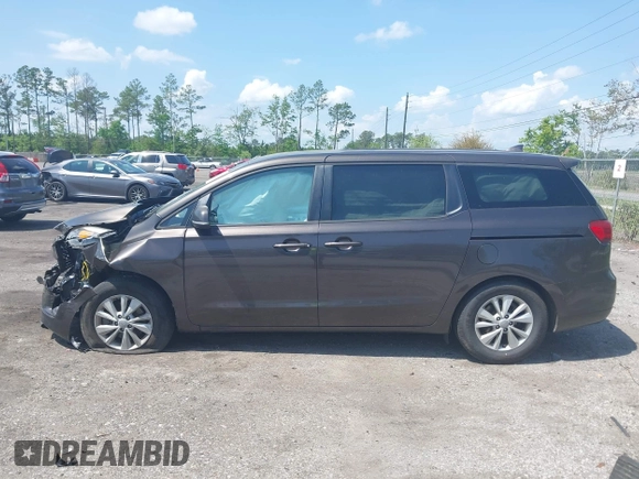 2017 Kia Sedona LX with VIN KNDMB5C15H6225200, listed as a IAAI auction lot 41929710 with 144,461 mi miles. Bid and sale history available at carsss.com. Image 14.