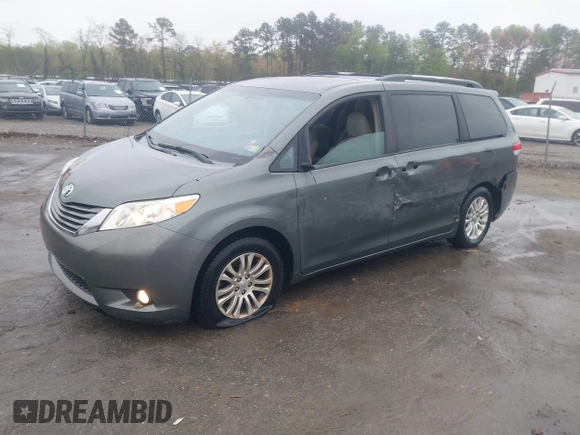2013 Toyota Sienna XLE AAS with VIN 5TDYK3DC8DS401561, listed as a IAAI auction lot 41990044 with 214,111 mi miles and . Bid and sale history available at DreamBid. Image 17.