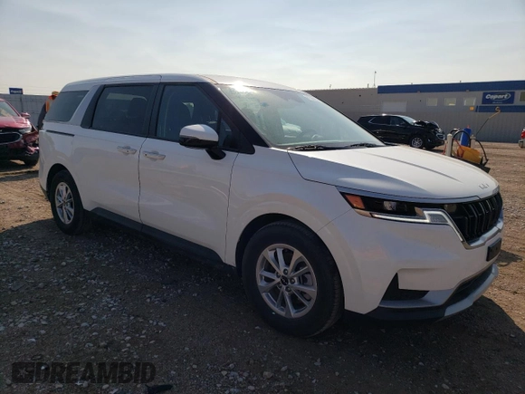 2023 Kia Carnival LX with VIN KNDNB4H35P6260181, listed as a Copart auction lot 74240714 with 6,879 mi miles and Salvage Title. Bid and sale history available at carsss.com. Image 4.