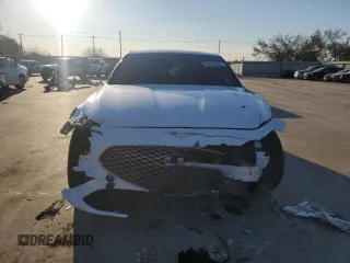 2022 Genesis G70 3.3T with VIN KMTG54TE5NU094831, listed as a Copart auction lot 83879004 with 57,449 mi miles and Salvage Title. Bid and sale history available at DreamBid. Image 5.