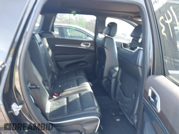 2014 Jeep Grand Cherokee Overland with VIN 1C4RJECG4EC523747, listed as a IAAI auction lot 40802143 with 124,079 mi miles. Bid and sale history available at carsss.com. Image 8.