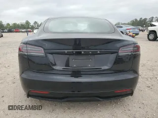 2023 Tesla Model S z VIN 5YJSA1E58PF531166, wystawiony jako Copart lot #51827565 z przebiegiem Nie podano mil oraz Szkoda całkowita • Salvage title. Historia ofert i sprzedaży dostępna na DreamBid. Obrazek 6.