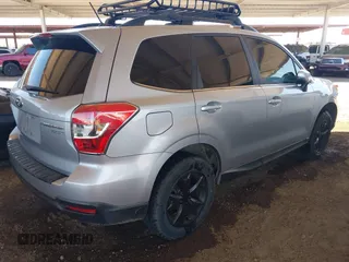 2014 Subaru Forester 2.5i Touring with VIN JF2SJAPCXEH495314, listed as a IAAI auction lot 42048073 with 156,998 mi miles. Bid and sale history available at carsss.com. Image 4.