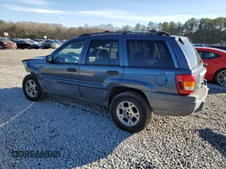 2001 Jeep Grand Cherokee Laredo z VIN 1J4GW48S91C578800, wystawiony jako Copart lot #87934695 z przebiegiem 250 784 mil mil oraz Szkoda całkowita • Salvage title. Historia ofert i sprzedaży dostępna na DreamBid. Obrazek 2.