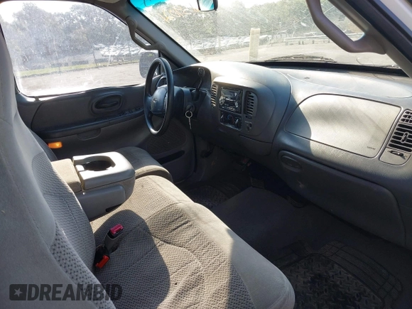 2000 Ford F-150 XL with VIN 1FTRX17L7YNB73649, listed as a IAAI auction lot 42159021 with Not provided miles and . Bid and sale history available at DreamBid. Image 5.