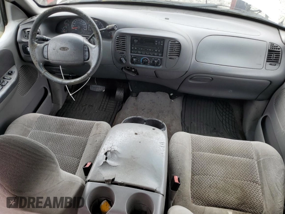 2001 Ford F-150 XLT z VIN 1FTRW08L81KB53980, wystawiony jako Copart lot #50366275 z przebiegiem 240 564 mil mil oraz Czysty tytuł • Clean title. Historia ofert i sprzedaży dostępna na DreamBid. Obrazek 8.