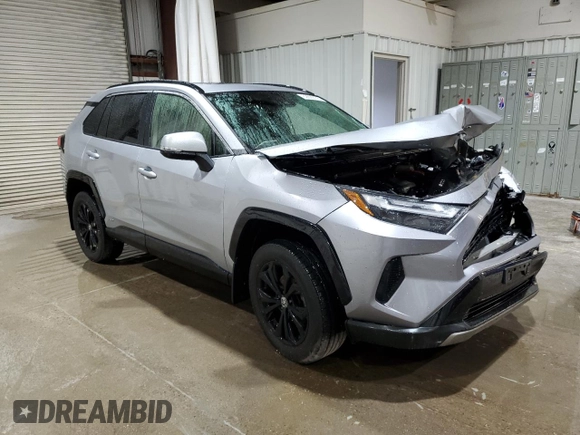 2022 Toyota RAV4 Hybrid SE with VIN JTM16RFVXND052911, listed as a Copart auction lot 62829175 with 84,035 mi miles and Salvage title. Bid and sale history available at DreamBid. Image 4.
