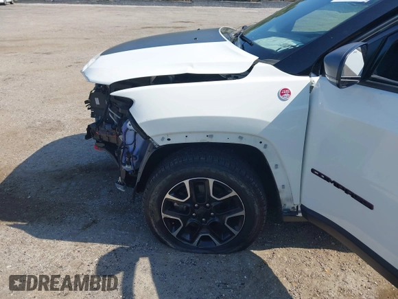 2021 Jeep Compass Trailhawk with VIN 3C4NJDDB7MT564467, listed as a IAAI auction lot 42330939 with 76,963 mi miles and . Bid and sale history available at DreamBid. Image 6.