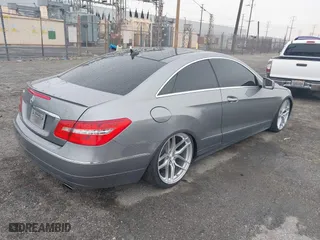 2011 Mercedes-Benz E-Class E 350 with VIN WDDKJ5GB6BF113516, listed as a IAAI auction lot 41735933 with 143,351 mi miles. Bid and sale history available at carsss.com. Image 4.