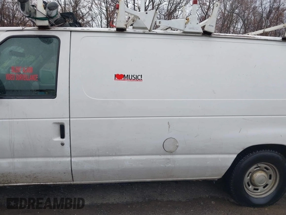 2004 Ford Econoline Cargo with VIN 1FTRE14W44HB53758, listed as a IAAI auction lot 40926124 with 139,104 mi miles. Bid and sale history available at carsss.com. Image 13.