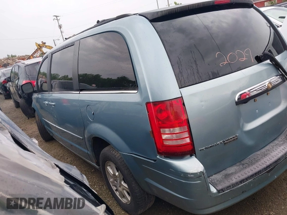 2008 Chrysler Town & Country Touring with VIN 2A8HR54P08R663396, listed as a IAAI auction lot 39554554 with 174,327 mi miles and . Bid and sale history available at DreamBid. Image 3.