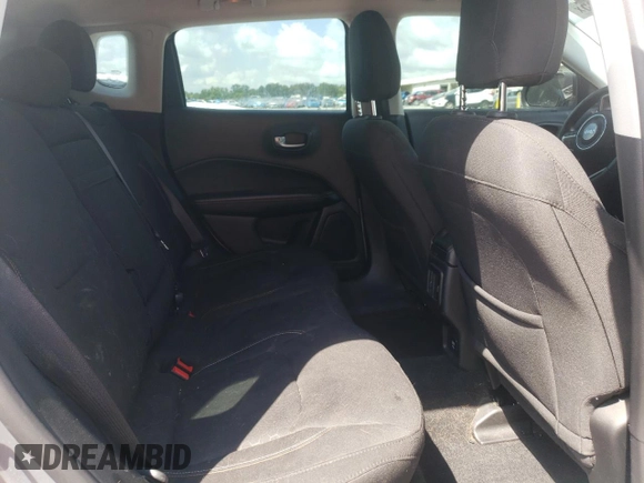 2017 Jeep Compass Sport z VIN 3C4NJCAB3HT652338, wystawiony jako Copart lot #63076055 z przebiegiem 109 701 mil mil oraz Szkoda całkowita • Salvage title. Historia ofert i sprzedaży dostępna na DreamBid. Obrazek 11.