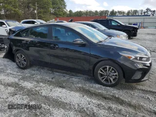 2024 Kia Forte LXS with VIN 3KPF24AD3RE824088, listed as a Copart auction lot 44190005 with 11,003 mi miles and Salvage Title. Bid and sale history available at carsss.com. Image 4.