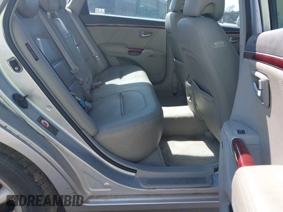 2006 Hyundai Azera SE with VIN KMHFC46FX6A107141, listed as a IAAI auction lot 41793111 with 124,137 mi miles and . Bid and sale history available at DreamBid. Image 8.