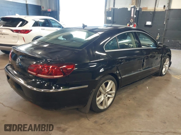 2015 Volkswagen CC R-Line with VIN WVWBP7AN8FE828106, listed as a IAAI auction lot 41867821 with 67,067 mi miles and . Bid and sale history available at DreamBid. Image 4.