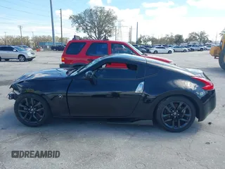 2017 Nissan 370Z with VIN JN1AZ4EH5HM954458, listed as a IAAI auction lot 41629907 with 113,606 mi miles. Bid and sale history available at carsss.com. Image 13.