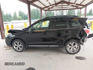 2018 Subaru Forester Touring with VIN JF2SJAWC2JH598982, listed as a IAAI auction lot 42455652 with 57,254 mi miles and . Bid and sale history available at DreamBid. Image 15.