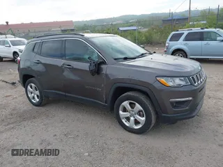 2020 Jeep Compass Latitude with VIN 3C4NJDBB3LT156694, listed as a IAAI auction lot 42209956 with 72,519 mi miles and . Bid and sale history available at DreamBid. Image 1.