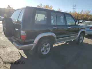 2001 Isuzu Trooper S z VIN JACDJ58X217J01836, wystawiony jako Copart lot #77548874 z przebiegiem Nie podano mil oraz Tytuł czysty. Historia ofert i sprzedaży dostępna na DreamBid. Obrazek 3.