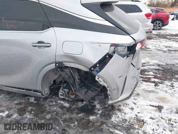 2024 Lexus RX 350 with VIN 2T2BAMCA1RC057999, listed as a IAAI auction lot 41447045 with 8,599 mi miles and . Bid and sale history available at DreamBid. Image 6.