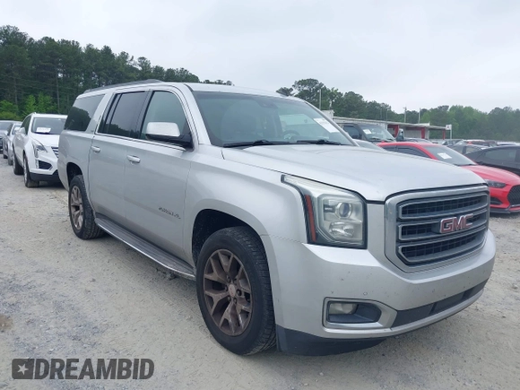 2015 GMC Yukon XL SLT with VIN 1GKS1HKC2FR251672, listed as a IAAI auction lot 42152312 with 232,736 mi miles and . Bid and sale history available at carsss.com. Image 1.