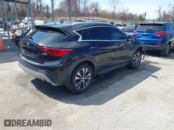 2017 Infiniti QX30 Premium with VIN SJKCH5CR7HA022688, listed as a IAAI auction lot 41883348 with 87,419 mi miles and . Bid and sale history available at DreamBid. Image 4.