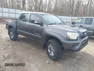2013 Toyota Tacoma PreRunner z VIN 5TFJU4GN4DX035574, wystawiony jako IAAI lot #41465269 z przebiegiem 120 518 mil mil oraz . Historia ofert i sprzedaży dostępna na DreamBid. Obrazek 1.