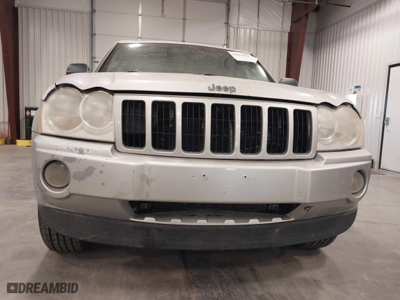 2007 Jeep Grand Cherokee Laredo with VIN 1J8GR48K57C687365, listed as a IAAI auction lot 42038456 with 162,343 mi miles. Bid and sale history available at carsss.com. Image 6.