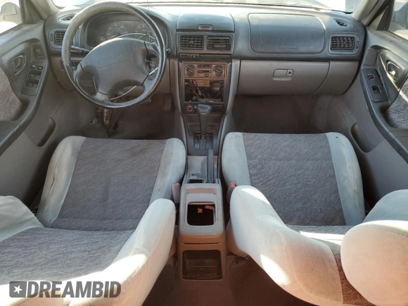 1999 Subaru Forester L with VIN JF1SF635XXH741226, listed as a Copart auction lot 86736214 with 287,417 mi miles and Salvage Title. Bid and sale history available at carsss.com. Image 8.