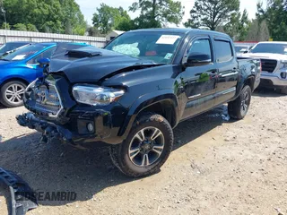 2017 Toyota Tacoma SR5 z VIN 5TFAZ5CNXHX048879, wystawiony jako IAAI lot #42157227 z przebiegiem 119 932 mil mil oraz . Historia ofert i sprzedaży dostępna na DreamBid. Obrazek 2.