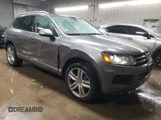 2013 Volkswagen Touareg Lux with VIN WVGEF9BP6DD002607, listed as a Copart auction lot 83420704 with 143,571 mi miles and Salvage Title. Bid and sale history available at DreamBid. Image 4.