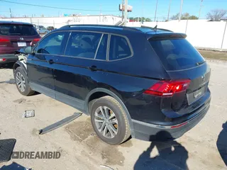 2022 Volkswagen Tiguan S with VIN 3VV1B7AX7NM107779, listed as a IAAI auction lot 41210258 with 57,154 mi miles and . Bid and sale history available at DreamBid. Image 3.