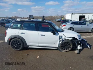 2020 MINI Countryman Cooper S z VIN WMZYX1C06L3M01166, wystawiony jako IAAI lot #41540885 z przebiegiem 37 008 mil mil oraz . Historia ofert i sprzedaży dostępna na DreamBid. Obrazek 12.