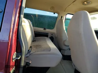 2005 Ford Econoline Passenger XL with VIN 1FBNE31LX5HB07328, listed as a Copart auction lot 80630434 with 173,474 mi miles and Salvage Title. Bid and sale history available at carsss.com. Image 11.