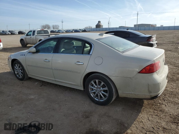 2010 Buick Lucerne CXL Premium with VIN 1G4HJ5EM0AU129841, listed as a Copart auction lot 48680685 with 140,017 mi miles and Salvage Title. Bid and sale history available at DreamBid. Image 2.