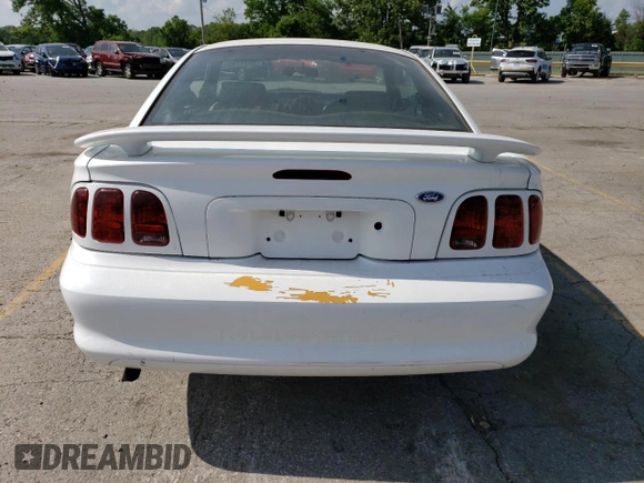 1996 Ford Mustang with VIN 1FALP4041TF206244, listed as a Copart auction lot 56311934 with 123,572 mi miles and Salvage Title. Bid and sale history available at carsss.com. Image 6.