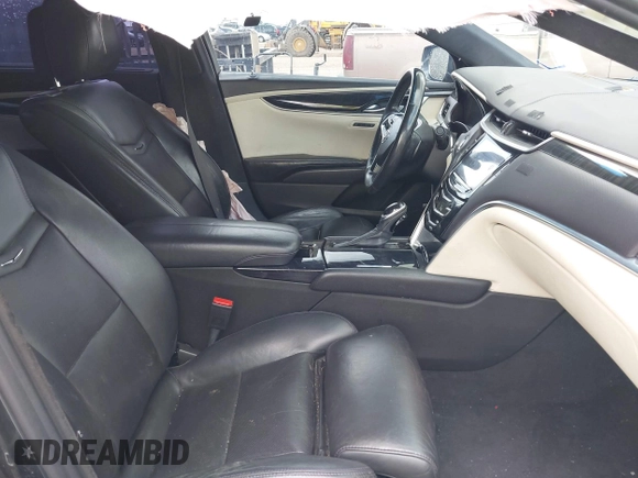 2013 Cadillac XTS Platinum z VIN 2G61V5S32D9102537, wystawiony jako IAAI lot #42230895 z przebiegiem 120 810 mil mil oraz . Historia ofert i sprzedaży dostępna na DreamBid. Obrazek 5.