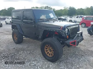 2012 Jeep Wrangler Sport with VIN 1C4AJWAG2CL286680, listed as a IAAI auction lot 42434411 with 97,142 mi miles and . Bid and sale history available at DreamBid. Image 1.