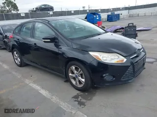 2014 Ford Focus SE with VIN 1FADP3K27EL199542, listed as a IAAI auction lot 42071908 with 142,180 mi miles. Bid and sale history available at carsss.com. Image 1.
